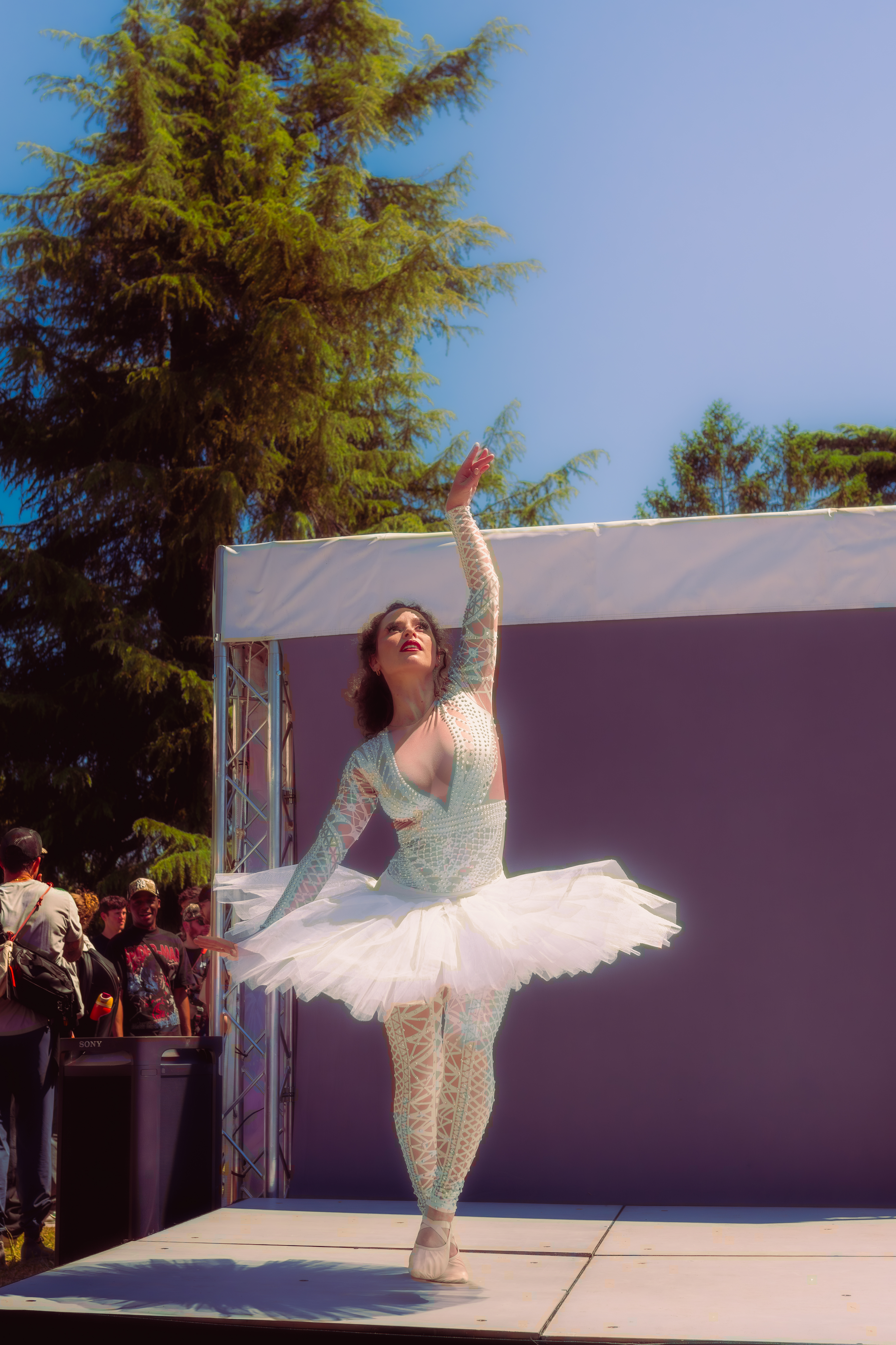 Ballerina in a white dress dancing
