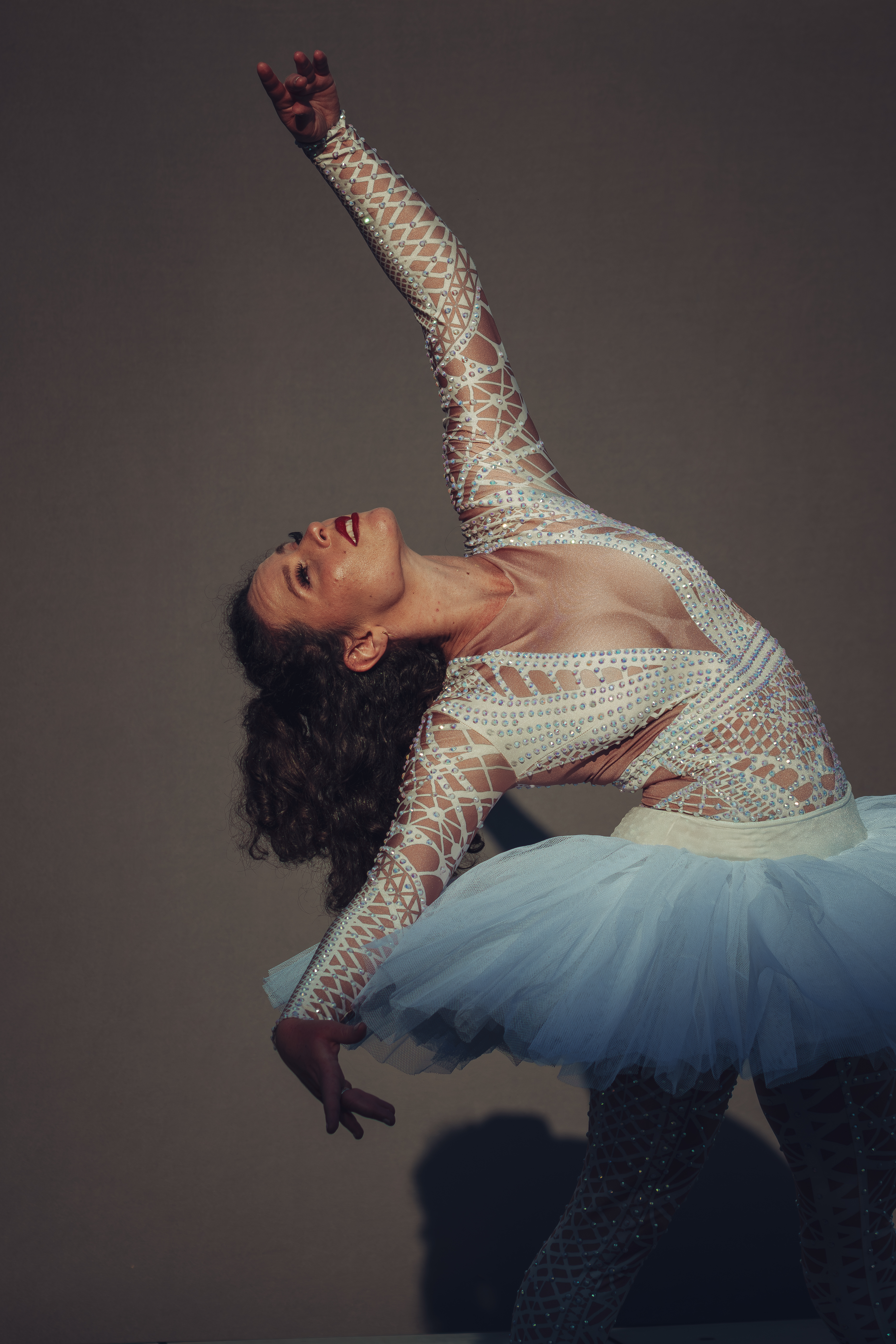 Ballerina in a white dress dancing
